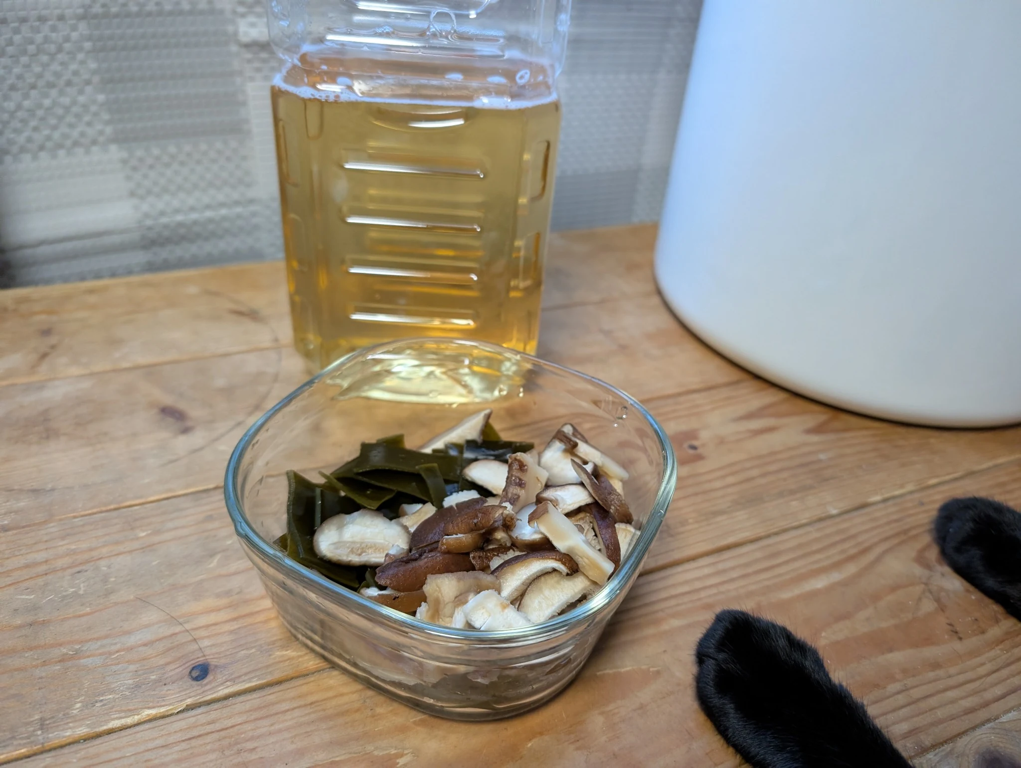 Finished vegan dashi with rehydrated kombu and shiitake mushrooms saved for cooking